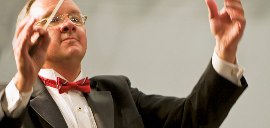 Guest conductor Peter Mansfield performs with the Cape Symphony in June 2019